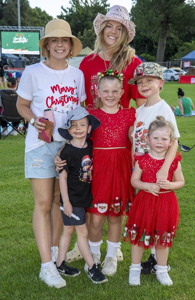 (Back from left) Casey Child and Sam Galligan. (Front from left) Ramsey Galligan, Mackenzie Child, Paddy Galligan and Josie Child. Triple M Mayoral Carols by Candlelight. Sunday 8th December, 2024. Picture: Nev Madsen.