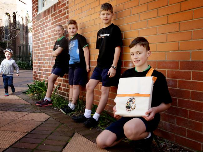 Manly Village students have come up with an invention that is a tracking device to find toddlers. Toddler Bertie Partington 4, Olivia Renton-Schmidt 11 , James Renton-Schmidt 9, Tal Carmel 10 and Archie Partington 11.