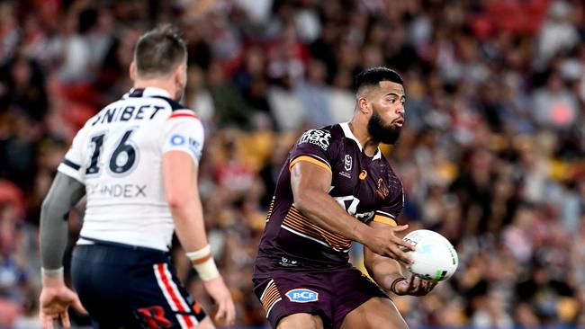 Payne Haas of the Broncos passes the ball. Picture: Bradley Kanaris/Getty Images