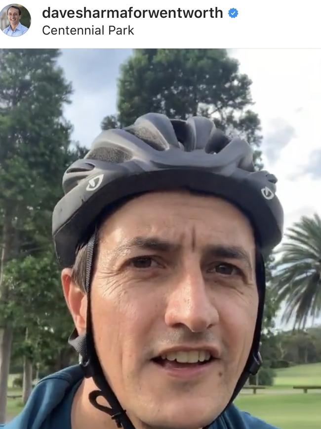 Liberal MP Dave Sharma cycles through Centennial Park.