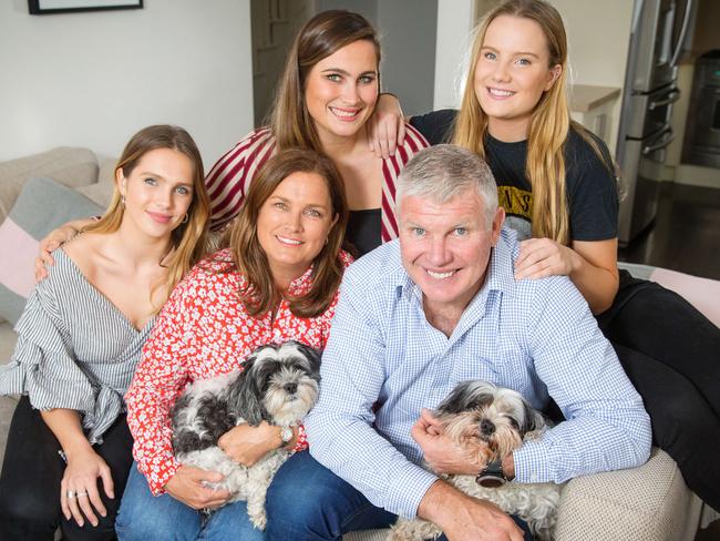 Former Australian rules footballer, coach and football commentator Danny Frawley speaks with Hamish McLachlan. Danny with wife Anita and daughters L to R Danielle, Chelsea and Keeley. Picture: Mark Stewart