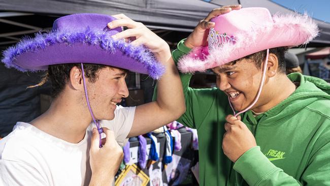 Drake Brighton (left) and Jesse Albury-Brady with new hats purchased at the Toowoomba Royal Show, Friday, April 19, 2024. Picture: Kevin Farmer<i/><i/>