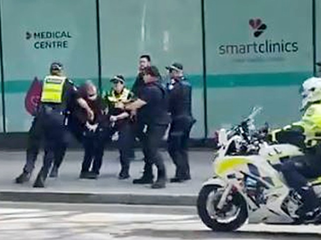 A man is arrested during the Neo Nazi demonstration.