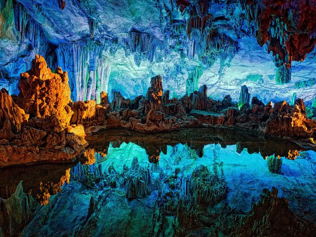 ***ONE TIME WEB USE ONLY*** **CONTACT NETWORK PIC DESK FOR PRINT RIGHTS*** Must credit Amrita Carroll/Media Drum World/australscope Headshot of photographer Scott Graham. FEAST your eyes on what could be the worldâ€™s most colourful cave that welcomes visits at 790-feet under the surface of the Earth. Pictures from the cave show how impressively lit up the already spectacular natural formations are with cold blues, fiery reds and bright greens that create a jaw-dropping underground riot of colour. American photographer Scott Graham (53) journeyed to Chinaâ€™s Reed Flute Cave after stumbling upon the attraction while visiting the countryâ€™s Guilin Province.