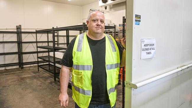 Dario Fontanarosa of Fine Food Cucina at Newton, standing in his empty fridge after having to dump thousands of dollars worth of food. Picture: Brenton Edwards