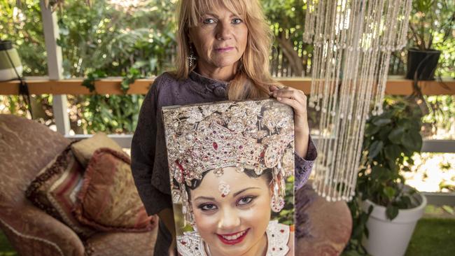 12th June 2018. Sonia Anderson holding an image of her daughter Bianca Girven, who was murdered by her partner 9 years ago. Controversy over a new book by forensic psychiatrist Donald Grant on 10 Queensland killers he assessed. Sonia Anderson is distraught after finding out her daughter Bianca Girven's last words in the book. Bianca was murdered by her on-again off-again boyfriend Rhys Austin in Mt Gravatt in 2010.Photo: Glenn Hunt / The Australian