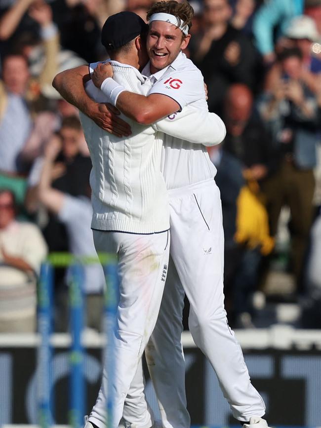 England's Stuart Broad (R) celebrates with England's James Anderson (L) after England's victory on day five of the fifth Ashes cricket Test.