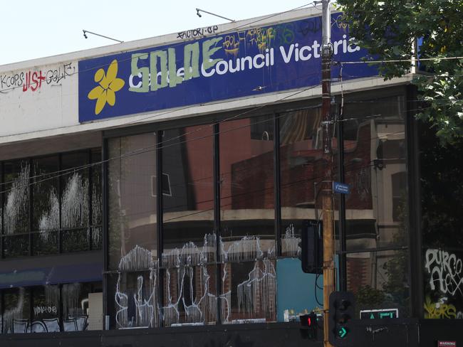 Graffiti on the former Cancer Council building at Rathdowne St. Picture: David Crosling