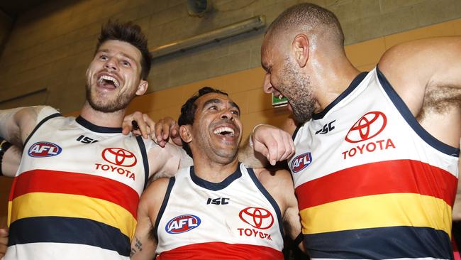 Bryce Gibbs, Eddie Betts and Cameron Ellis-Yolmen of the Crows sing the team song. Picture: Dylan Burns/AFL Photos