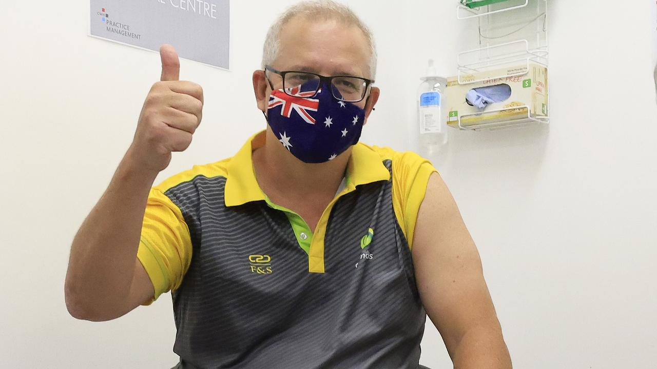 Prime Minister Scott Morrison gives the thumbs up after receiving a COVID-19 vaccination at Castle Hill Medical Centre on February 21. Picture: Mark Evans/Getty Images