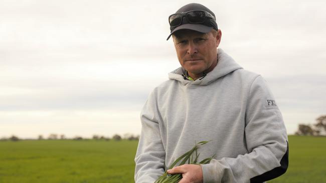 Ouyen grain grower Jarrod Munro at the Ouyen football club's community crop on June 20, 2022. Picture: Else Kennedy