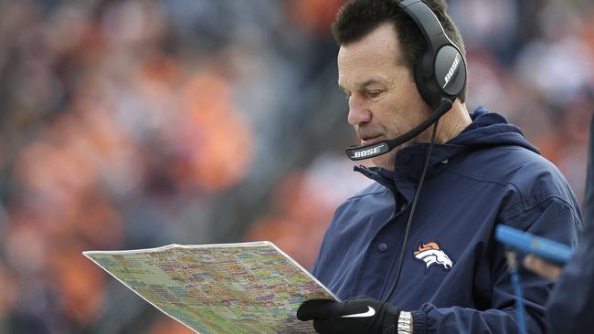 Photo: Denver Broncos Head Coach Gary Kubiak holds the Lombardi Trophy -  SBP20160207097 