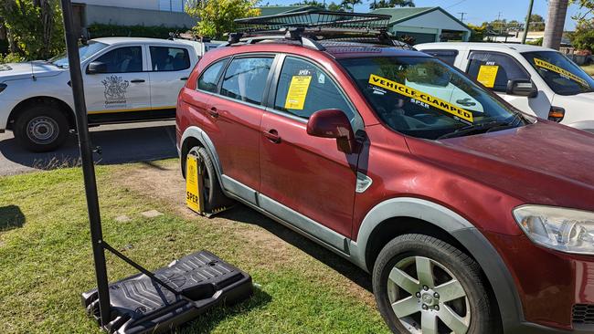 A vehicle clamped as part of a week-long operation by the State Penalties Enforcement Registry (SPER) to recover unpaid fines and penalties in the Townsville region. Picture: Supplied