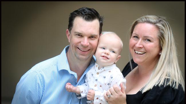 Michael Waggitt and Anna Jowitt with 1 year old son Hamish who will benefit from a huge donation of properties from a mystery donor to the RBWH Foundation. Picture: Jamie Hanson.