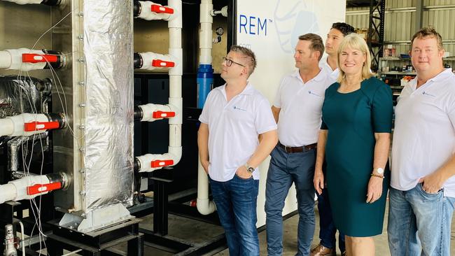 Minister for Renewable Energy Eva Lawler inspects Aqua Aerem's mini hydrogen plant with, from left to right, Jarrod Ward, Gerard Reiter, Anthony Reiter and Steven Vassiloudis, which will be trialled at Tennant Creek. Picture: Gary Shipway