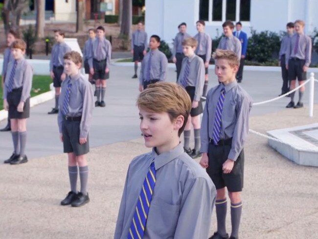 Marist College Ashgrove’s Performance Choir has shown its answer to social distancing by recording an awe inspiring 70 boy performance of “High Hopes” in front of the schools Tower Block. Picture: Supplied