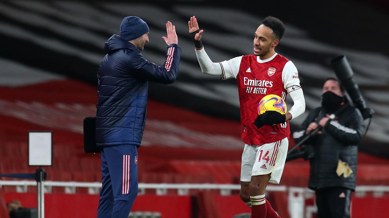 Pierre Emerick Aubameyang holds the match ball after scoring a hat-trick. (Photo by Catherine Ivill/Getty Images)