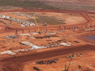 Gina Rinehart's $10bn Roy Hill project has flagged further delays to its first shipment of iron ore.