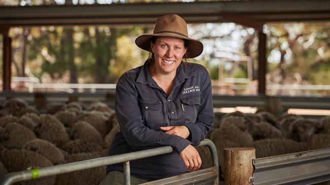 Farmer Hannah Robins pauses for breath amid work at her family farm on Kangaroo Island. Picture: Matt Loxton