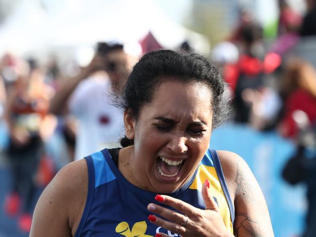 A competitor reacts after completing the Gold Coast Half Marathon.Photograph : Jason O'Brien