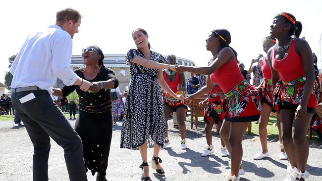 The royal couple get in the groove in Cape Town. Picture: Getty Images