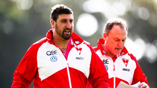 ADELAIDE, AUSTRALIA - AUGUST 10: John Longmire, Senior Coach of the Swans and assistant Dean Cox walk from the ground during the round 21 AFL match between the Port Adelaide Power and the Sydney Swans at Adelaide Oval on August 10, 2019 in Adelaide, Australia. (Photo by Daniel Kalisz/Getty Images)