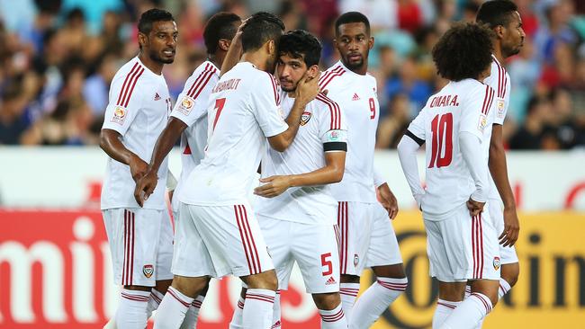 SYDNEY, AUSTRALIA - JANUARY 23: Ali Mabkhout of the United Arab Emirates celebrates with team mates after scoring a goal during the 2015 Asian Cup Quarter Final match between Japan and the United Arab Emirates at ANZ Stadium on January 23, 2015 in Sydney, Australia. (Photo by Brendon Thorne/Getty Images)