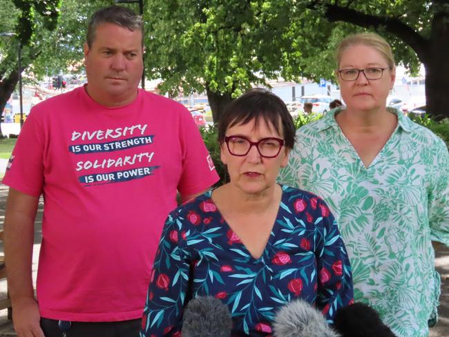 HACSU state secretary Robby Moore with Greens MP Helen Burnet and UWU representative Amy Brumby on Parliament Lawns in Hobart on Thursday, January 30, 2025.