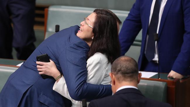 Gavin Pearce hugs Gladys Liu. Picture: Kym Smith