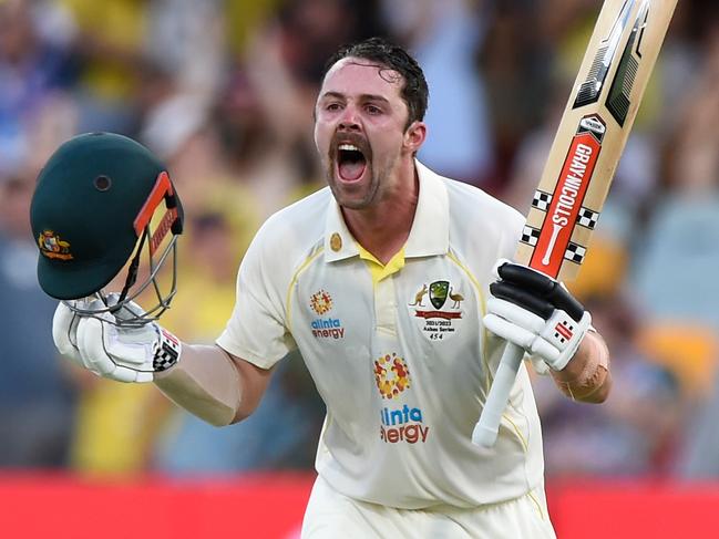 BRISBANE, AUSTRALIA - DECEMBER 09: Travis Head of Australia celebrates his test century during day two of the First Test Match in the Ashes series between Australia and England at The Gabba on December 09, 2021 in Brisbane, Australia. (Photo by Matt Roberts - CA/Cricket Australia via Getty Images)