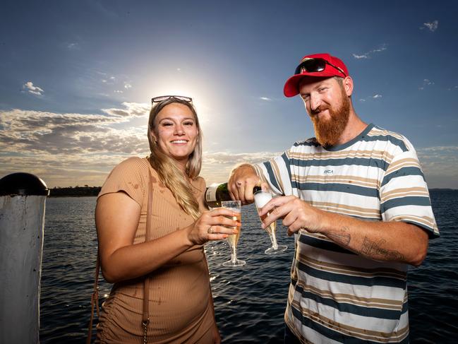 Savanah Fisher and Thomas Miller toast the New Year at Rye. Picture: Mark Stewart