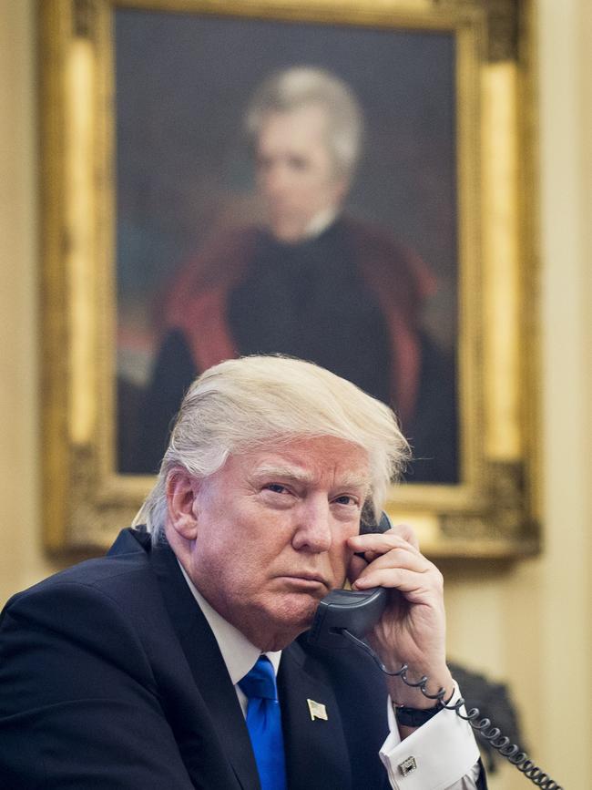 Donald Trump speaking to Malcolm Turnbull. Picture: Pete Marovich/Pool via CNP