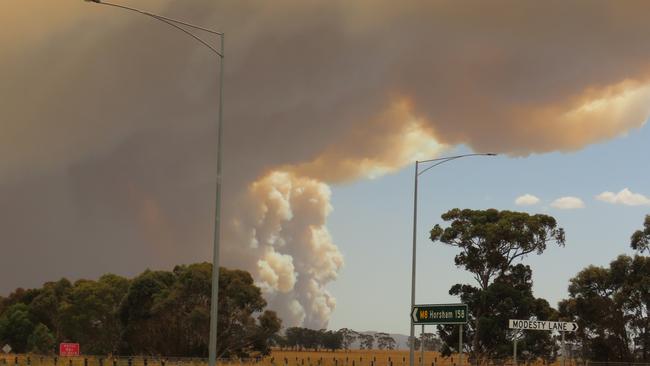 Clouds of smoke seen from the highway. Picture: Tim Cox