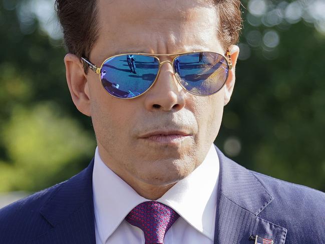 In this July 25, 2017, photo, White House communications director Anthony Scaramucci walks back to the West Wing of the White House in Washington.  Scaramucci is out as White House communications director after just 11 days on the job.  A person close to Scaramucci confirmed the staffing change just hours after President Donald Trumpâ€™s new chief of staff, John Kelly, was sworn into office.  (AP Photo/Pablo Martinez Monsivais)