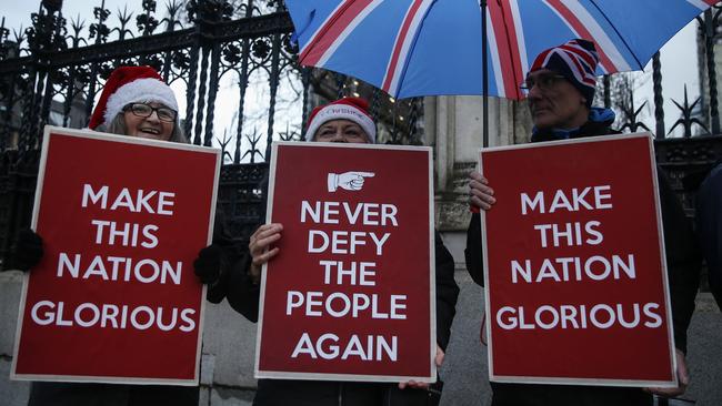 Pro-Brexit campaigners placards near the Houses of Parliament in December 2019. Picture: Hollie Adams, via Getty Images