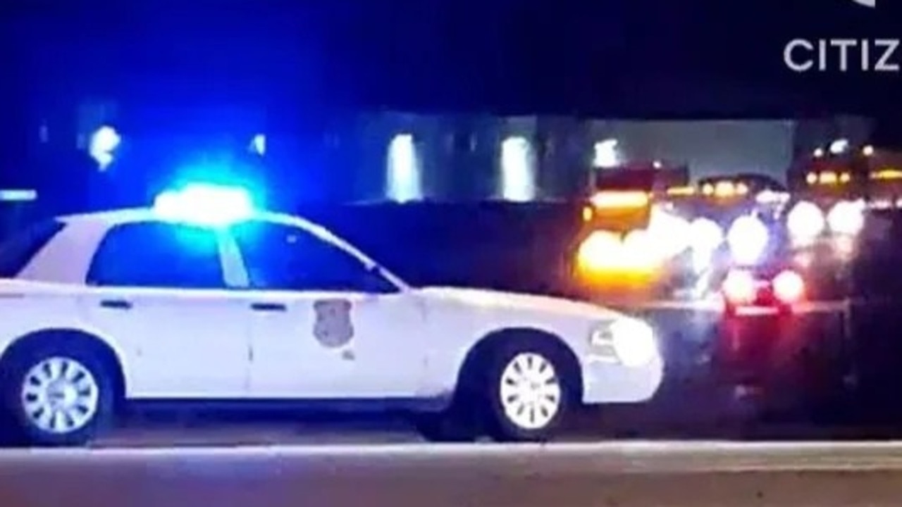 Police on Thursday night after the shooting massacre at Indianapolis’s FedEx facility near the airport. Picture: Supplied.