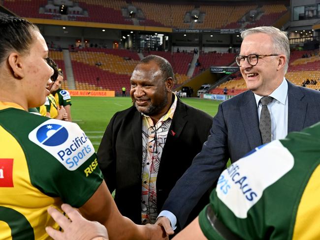 BRISBANE, AUSTRALIA - SEPTEMBER 25: Australian Prime Minister Anthony Albanese and Papua New Guinean Prime Minister James Marape greet the players before the International match between the Australian Women's PMs XIII and PNG Women's PMs XIII at Suncorp Stadium on September 25, 2022 in Brisbane, Australia. (Photo by Bradley Kanaris/Getty Images)