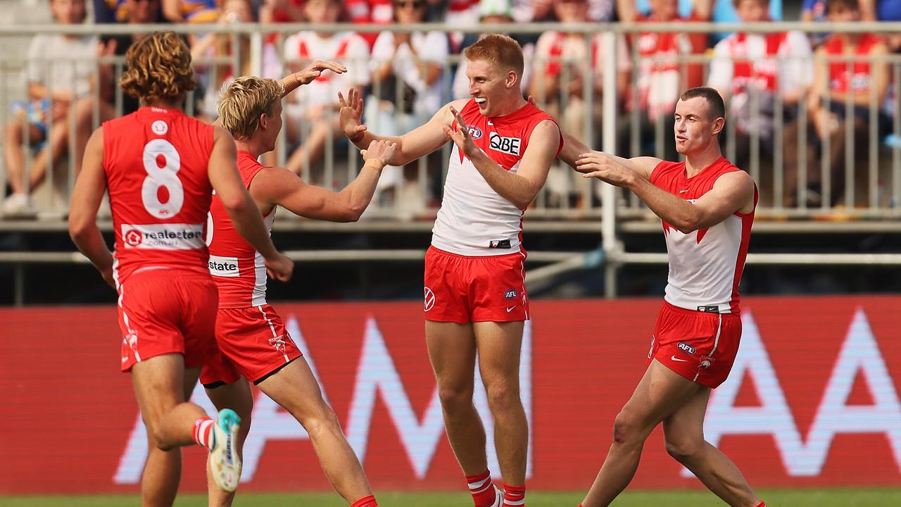 Matt Roberts kicks a goal for Sydney at Mount Barker, not far from where he grew up. Picture: James Elsby/Getty Images