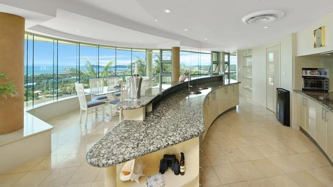 The architecturally designed three storey home boasts four bedrooms, four bathrooms, open plan family room, designer kitchen and wall to wall ocean and island views. Picture: Contributed