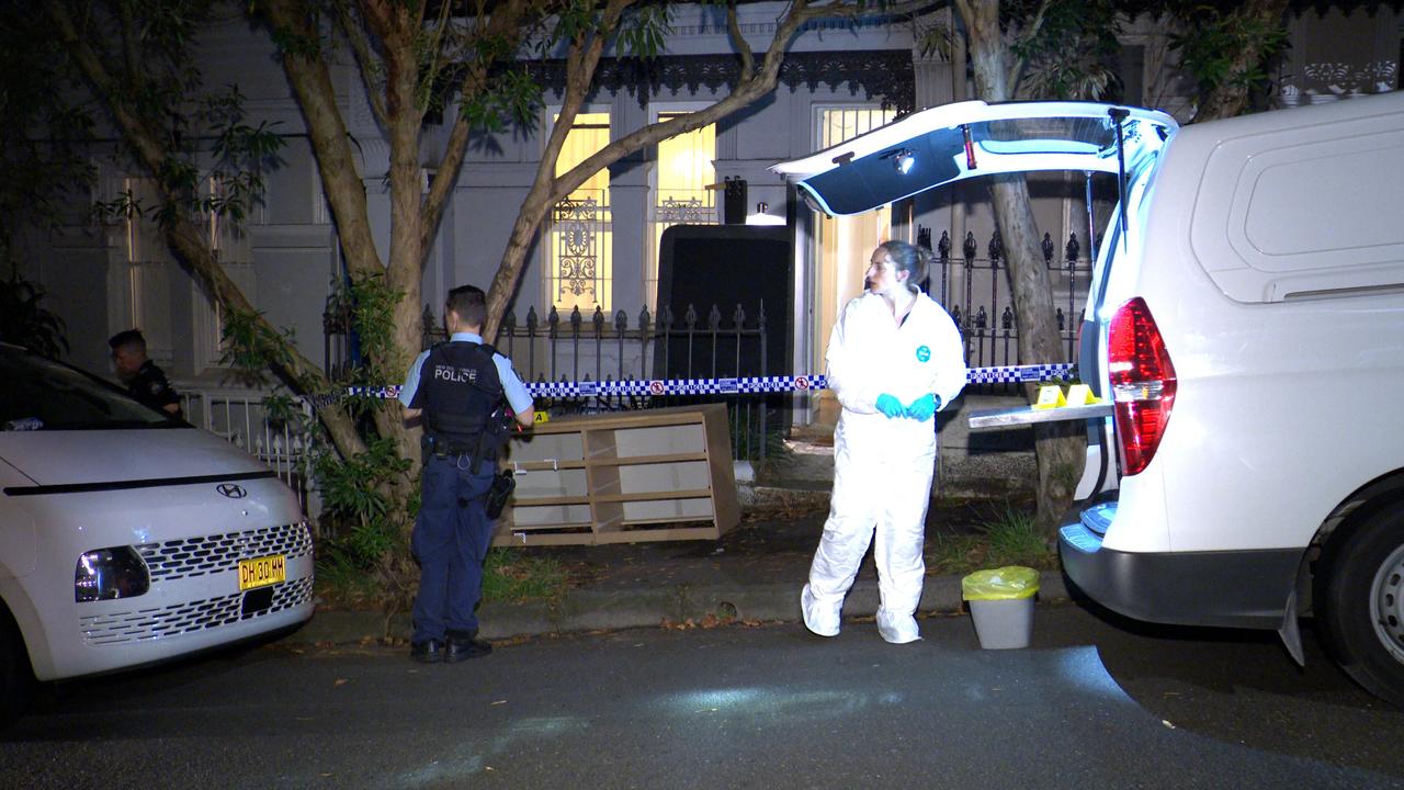 Police at the Paddington property on Wednesday night. Picture: OnScene Bondi