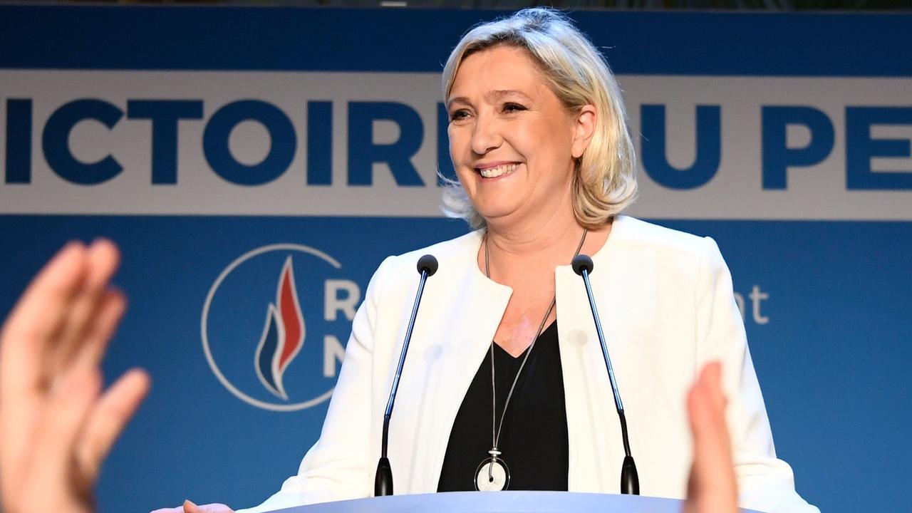 Marine Le Pen delivers a speech after the announcement of initial results in Paris. Picture: Bertrand Guay