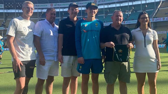 Todd Murphy with family after he was presented with his baggy green.