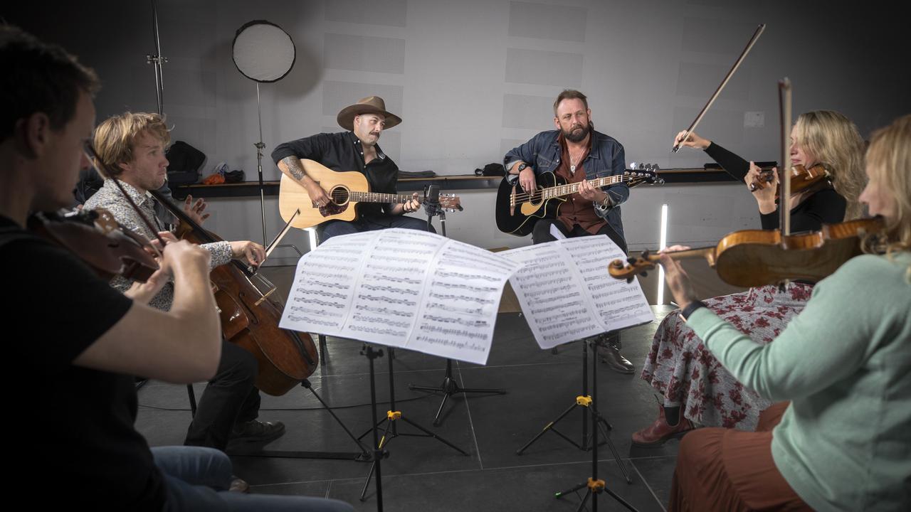 The Tasmanian Symphony Orchestra and The Wolfe Brothers rehearsing together in 2023 – principal viola Caleb Wright, principal cello Jonathan Bekes, Nick Wolfe, Tom Wolfe, violin/concertmaster Emma McGrath and principal second violin Lucy Carrig-Jones. Picture: Chris Kidd