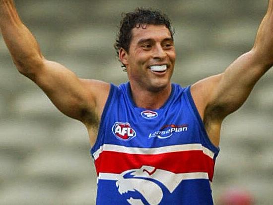 30/03/2003. Paul Dimattina celebrates a goal in the last quarter. Western Bulldogs v Geelong. Telstra Dome. Digital Image.