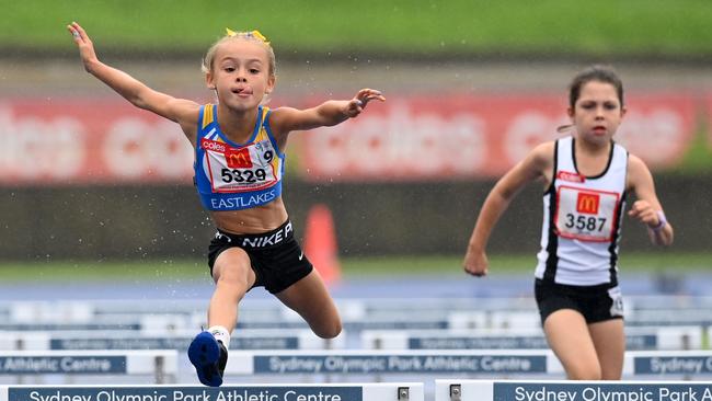 Maeva Clifford from Eastlakes soaring high in the hurdles.