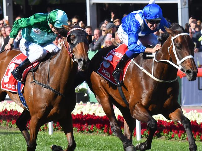 MELBOURNE, AUSTRALIA - OCTOBER 28:  Hugh Bowman riding Winx defeats Blake Shinn riding Humidor in Race 9, Ladbrokes Cox Plate  during Cox Plate Day at Moonee Valley Racecourse on October 28, 2017 in Melbourne, Australia.  (Photo by Vince Caligiuri/Getty Images)