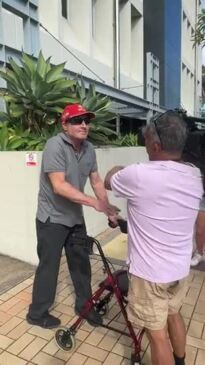 WATCH: Hospital cleaner threatens to hit Seven News camera person