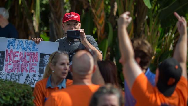 A man reacts to a pro-Trump street preacher. Picture: AFP