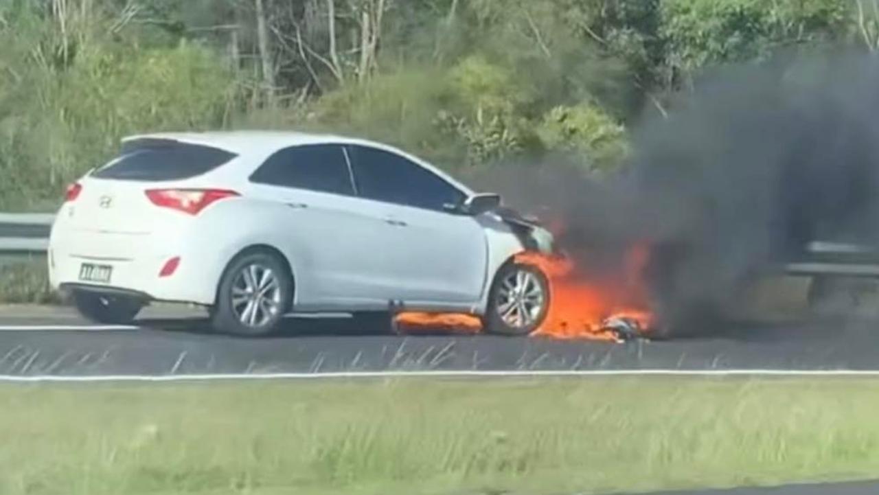 Emergency services rushed to a vehicle fire on the Sunshine Motorway about 4pm. Picture: Joshua Cooper