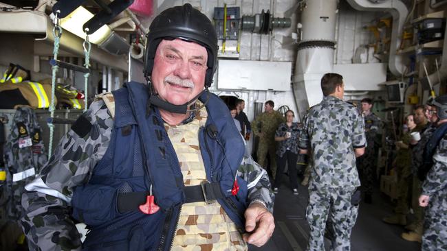 The colourful MP pictured during a visit to HMAS Newcastle in the Middle East in July.